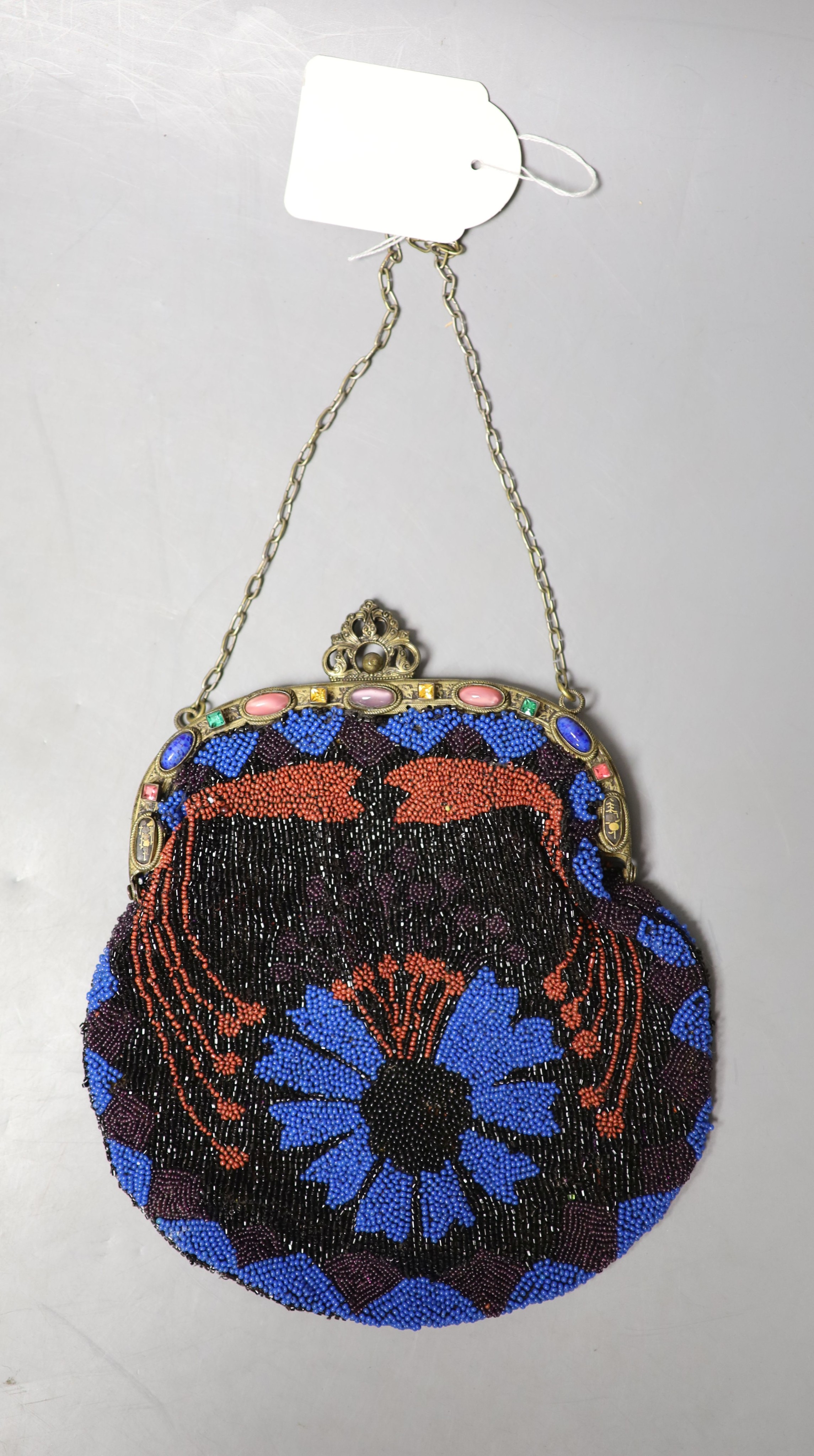 A collection of approximately fifty Victorian and later beadwork, white metal and fabric purses etc.